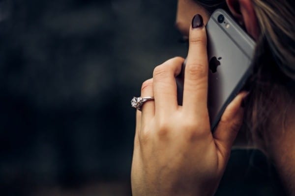woman speaking on the phone after the call wasn't call labeled or blocked